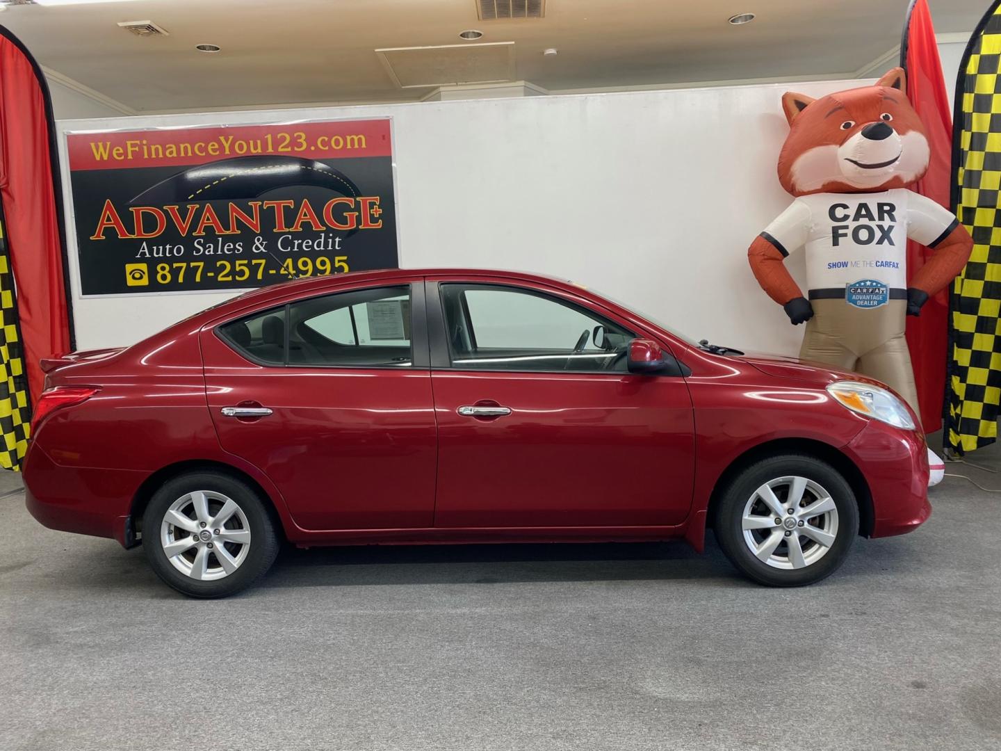 2013 RED /BLACK Nissan Versa (3N1CN7AP5DL) , located at 533 S West End Blvd., Quakertown, PA, 18951, (877) 257-4995, 40.343994, -75.303604 - INCLUDED IN THE SALE PRICE OF EVERY VEHICLE: 48 Hour Money Back Guarantee 6 Month - 6,000 Mile Warranty Brand New PA State Inspection & Emission $10 Oil Changes for the Life of the Loan Complete CARFAX - Photo#0